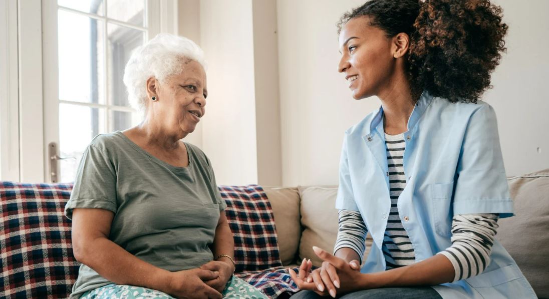 Older person with staff