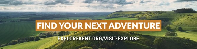 Shows a helicopter view of Kent countryside with rolling hills. Text shows 'Find your next adventure. Explorekent.org/visit-explore'